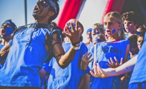 Youth shouting and participating in CG Victory